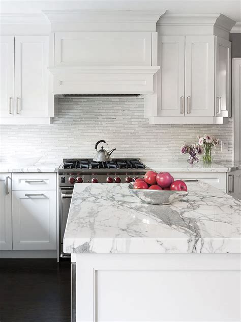 stainless steel backsplash tiles with white cabinets|white cabinets with marble backsplash.